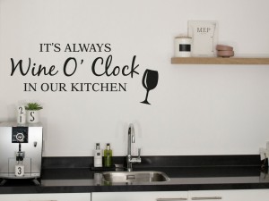 Muursticker "It's always Wine o'clock in our kitchen"