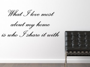 Muursticker "What I love most about my home is who I share it with" in sierletters