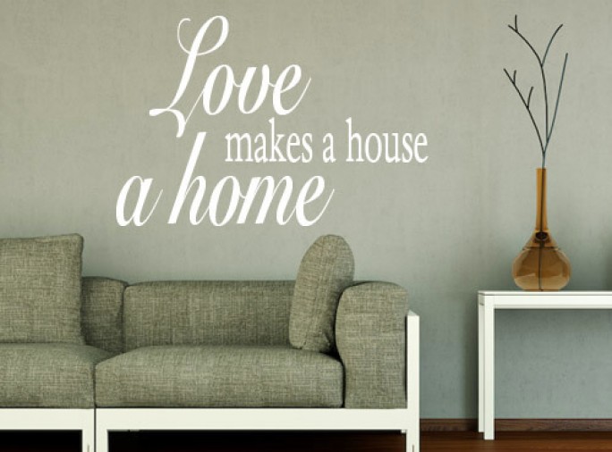 Muursticker "Love makes a house a home"